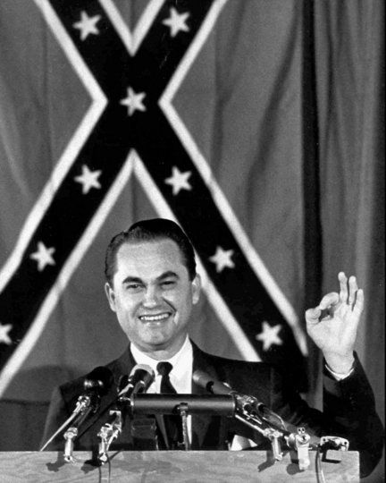 FILE--Alabama Gov. George C. Wallace is shown in this Oct. 19, 1964 photo speaking in Glen Burnie, Md. at a rally supporting Republican presidential candidate Sen. Barry Goldwater. The LBJ Library at the University of Texas in Austin releases presidential tapes about every six months in increments of three months at a time, in chronological order. The latest release covered January to March 1965, the early months after his 1964 election. Johnson's skills as a conciliator are on full display in early 1965 as he works a deal between civil rights leader Martin Luther King Jr. and then Alabama Gov. George Wallace in taped telephone conversations released Friday, May 26, 2000. (AP Photo, File)