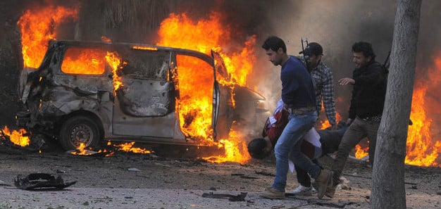 Syrian carnage_van burning banner