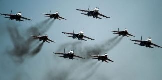 Russian jets pound ISIS capital in Syria as coalition voices anger