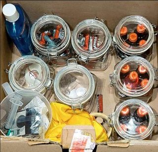 An early airline bomb making kit - trial photo from the Heathrow plane attempts