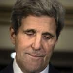 U.S. Secretary of State John Kerry pauses while speaking during a news conference in London